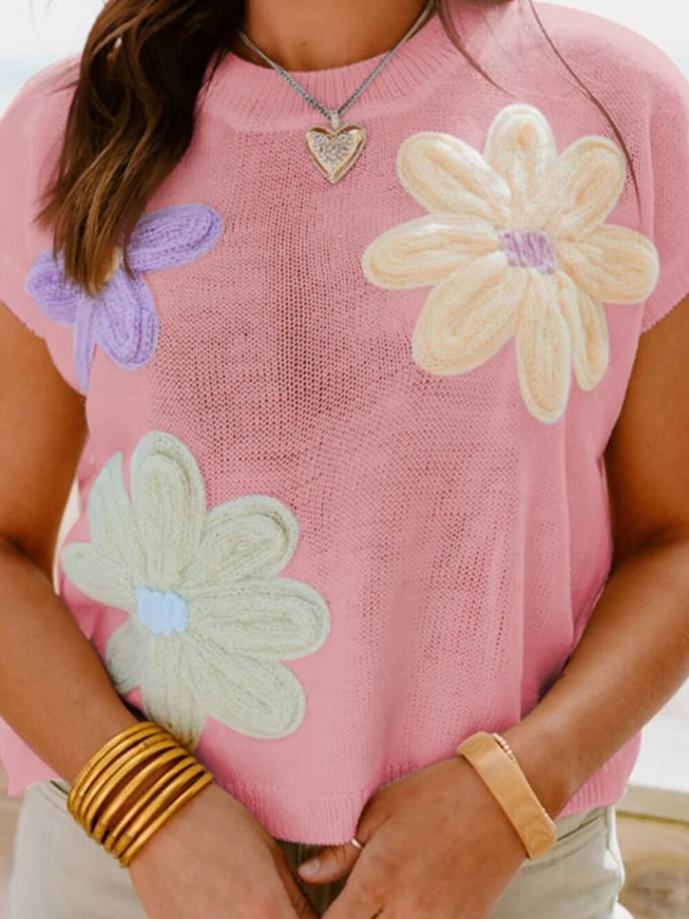 Pink floral sleeveless cotton sweater. Size: Large. Like New.
